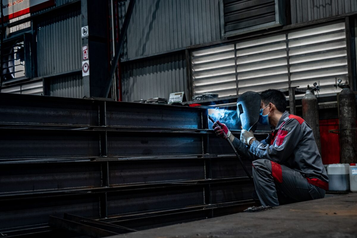 Welder working in a manufacturing workshop